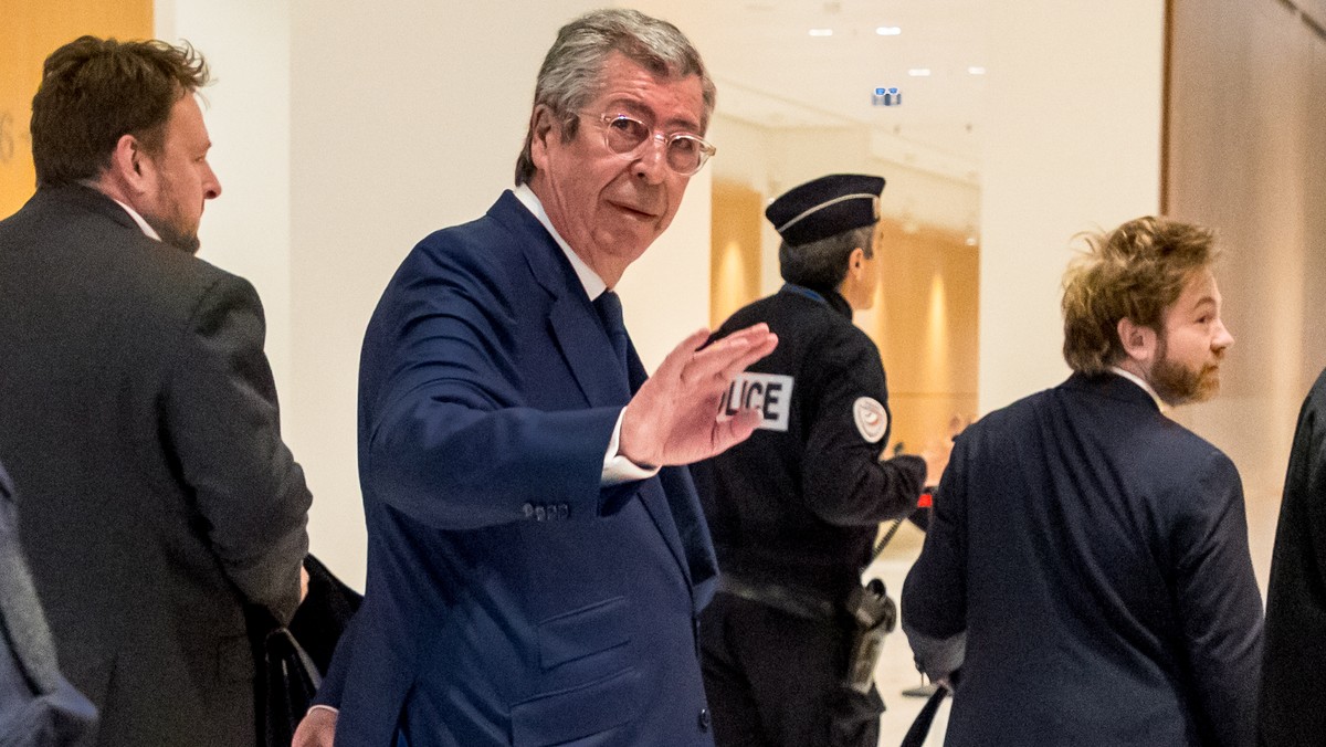 epa07567368 Mayor of Levallois-Perret Patrick Balkany (C) arrives at the Paris courthouse, 13 May 2019. Balkany is being prosecuted with his wife for two counts of tax fraud and he is suspected of hav ...