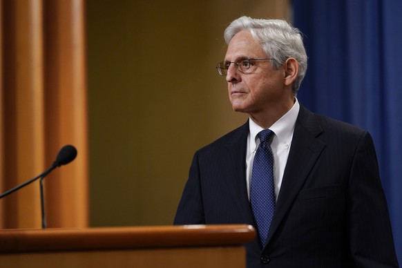FILE - Attorney General Merrick Garland listens to a question as he leaves the stage following a speech at the Justice Department on August 11, 2022 in Washington.  Garland wants to end sentencing inequality...