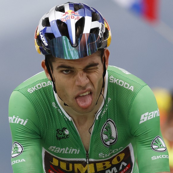 epa10068986 The Green Jersey Belgium rider Wout Van Aert of Jumbo Visma crosses the finish line during the 11th stage of the Tour de France 2022 over 151.7km from Albertville to the Col du Granon Serr ...