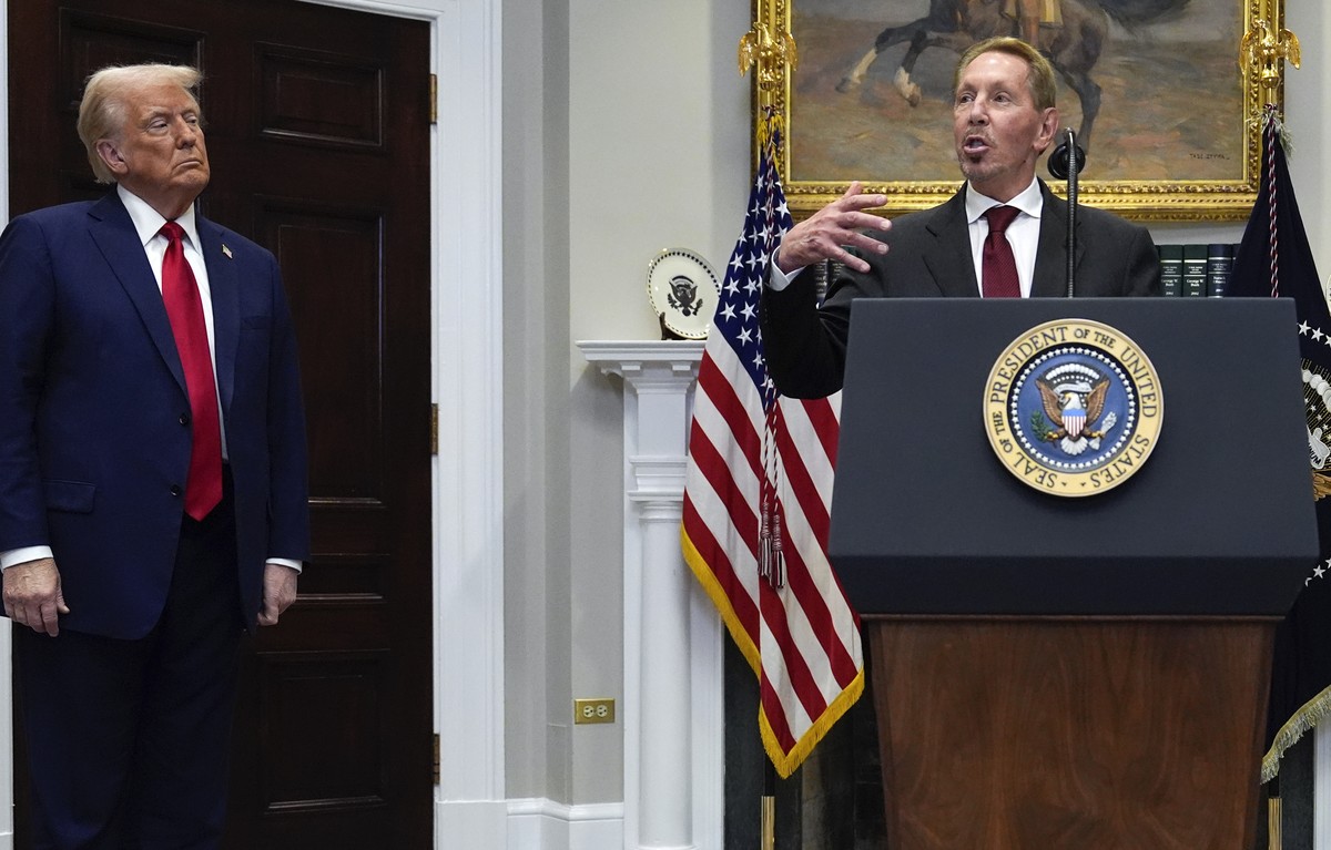 Larry Ellison, chairman of Oracle Corporation, center, speaks as President Donald Trump, left, and Masayoshi Son, SoftBank Group CEO, listen in the Roosevelt Room at the White House, Tuesday, Jan. 21, ...