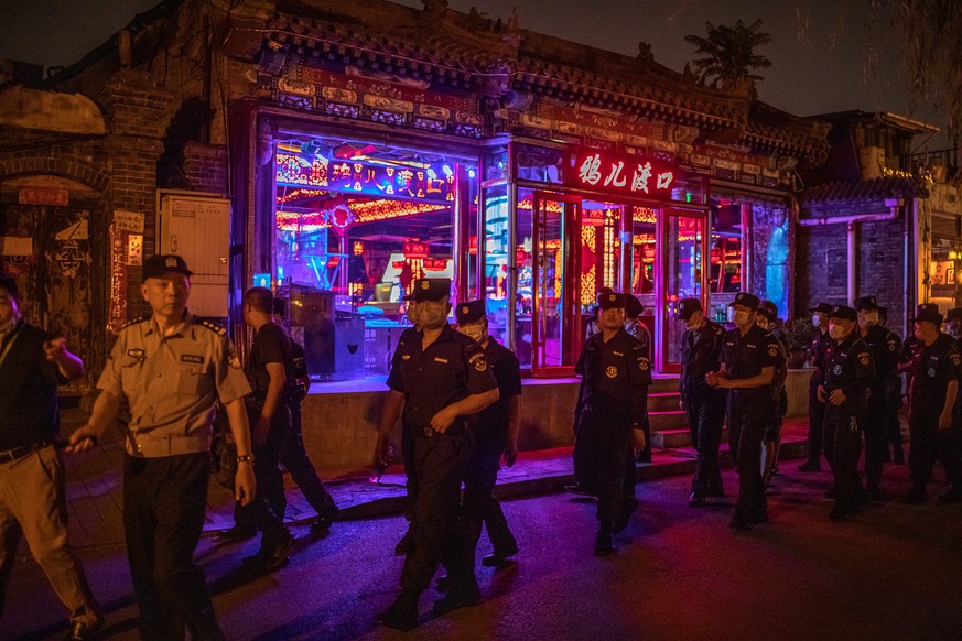 Polizei-Patrouillen in Peking überprüfen die Lage, 8. Juni.