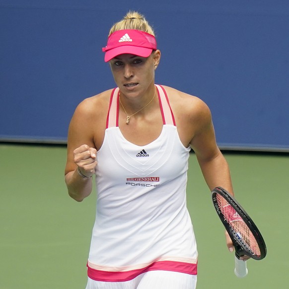 Angelique Kerber, of Germany, reacts after winning a point against Ajla Tomljanovic, of Australia, during the first round of the US Open tennis championships, Monday, Aug. 31, 2020, in New York. (AP P ...