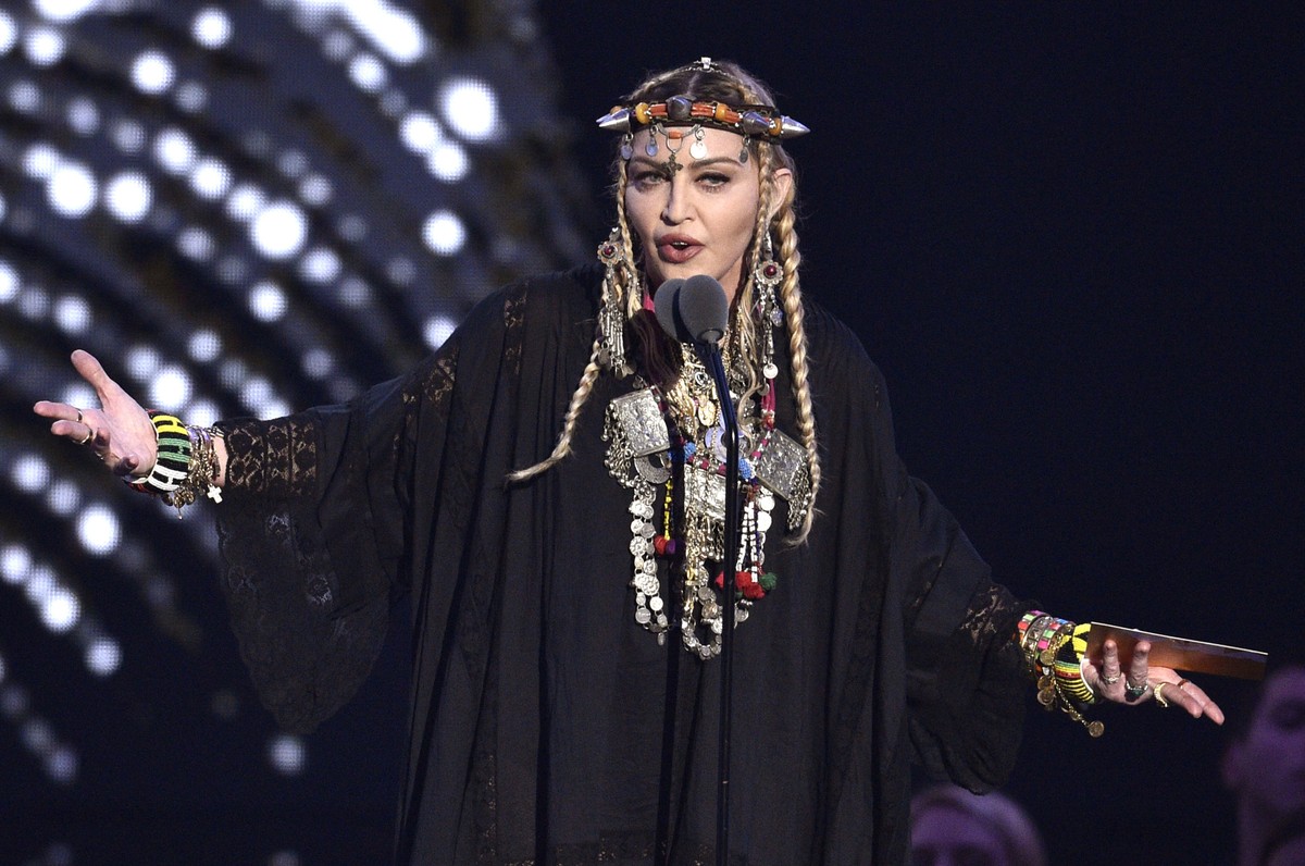 FILE - Madonna presents a tribute to Aretha Franklin at the MTV Video Music Awards on Aug. 20, 2018, at Radio City Music Hall in New York. The singer turns 65 on Aug. 16. (Photo by Chris Pizzello/Invi ...