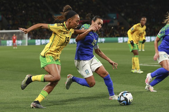 Brazil&#039;s Marta, right, compete for controls the ball with Jamaica&#039;s Tiernny Wiltshire during the Women&#039;s World Cup Group F soccer match between Jamaica and Brazil in Melbourne, Australi ...