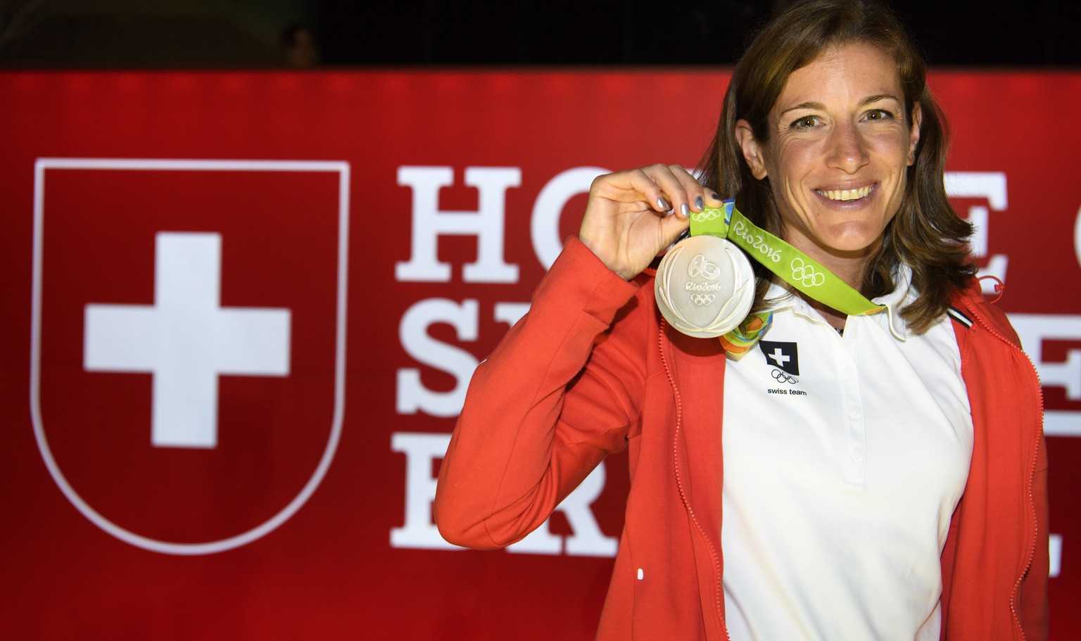 Nicola Spirig of Switzerland celebrates her silver medal in the womenÕs Triathlon in the House of Switzerland at the Rio 2016 Olympic Games in Rio de Janeiro, Brazil, on Saturday, August 20, 2016. (KE ...