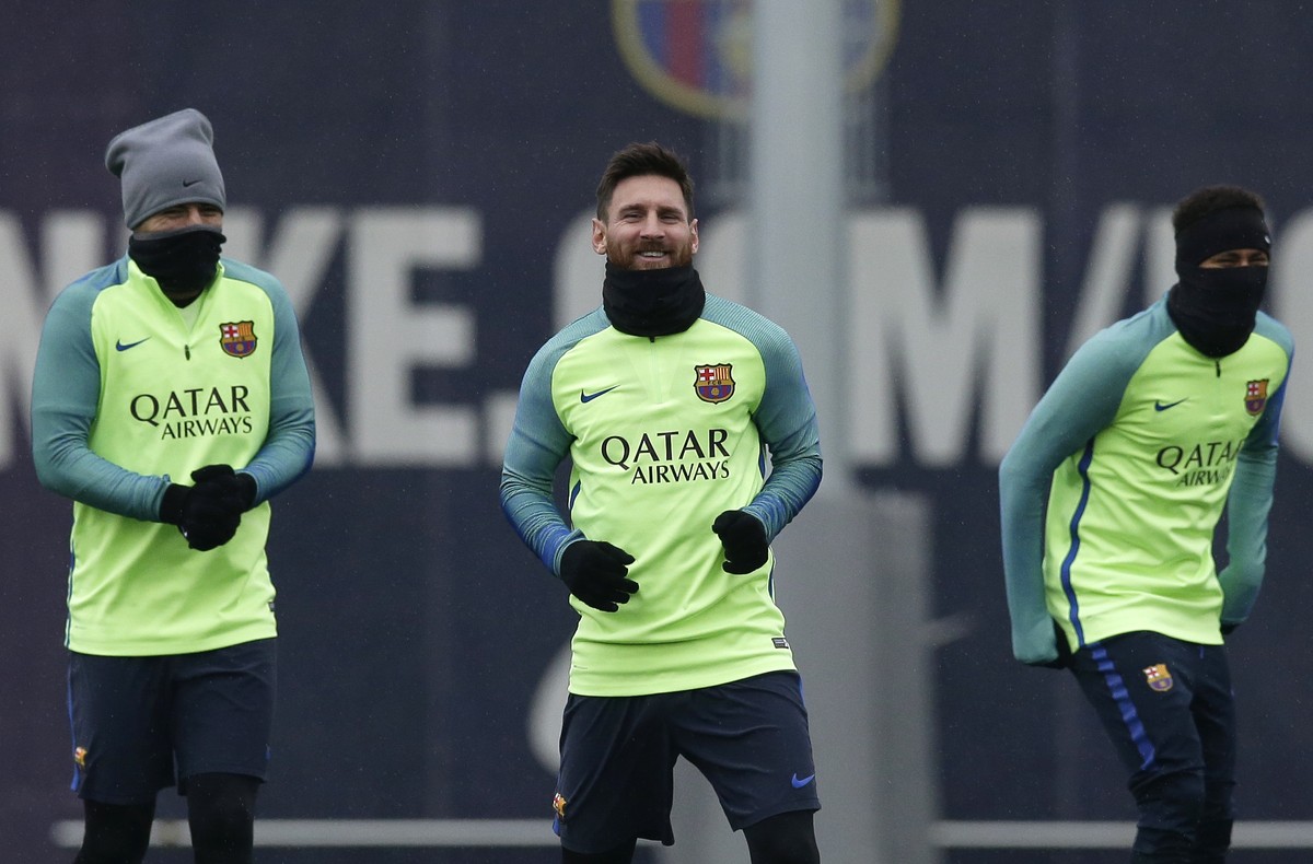 From Left to right FC Barcelona's Luis Suarez, Lionel Messi and Neymar exercise during a training session at the Sports Center FC Barcelona Joan Gamper in Sant Joan Despi, Spain, Wednesday, Jan.  ...