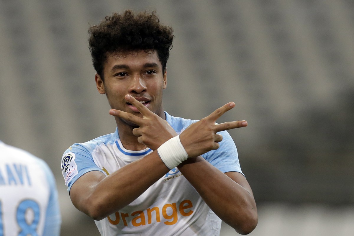 Marseille's Boubacar Kamara celebrates his side first goal during the French League One soccer match between Marseille and Bordeaux at the Velodrome Stadium, in Marseille, Tuesday, Feb. 5, 2019.  ...