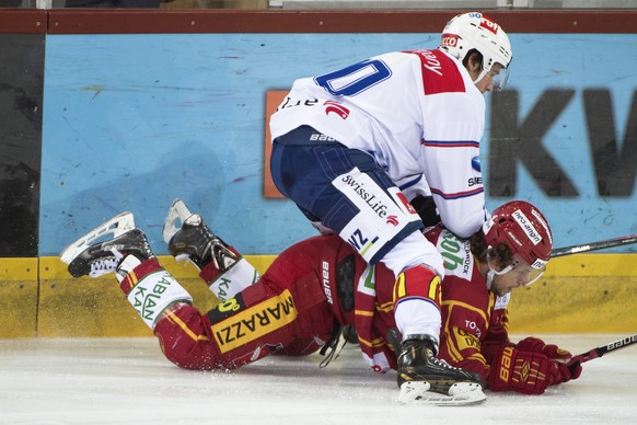 ZSC-Löwe Mattia Hinterkircher ist gegen Tiger Martin Stettler obenauf.&nbsp;