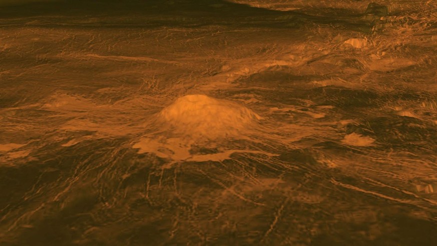This figure shows the volcanic peak Idunn Mons (at 46 degrees south latitude, 214.5 degrees east longitude) in the Imdr Regio area of Venus.