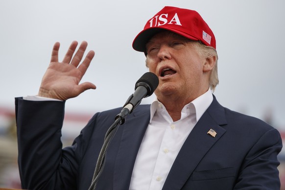 FILE - In this Saturday, Dec. 17, 2016 file photo, U.S. President-elect Donald Trump speaks during a rally at Ladd-Peebles Stadium in Mobile, Ala. China said Saturday its military seized a U.S. Navy u ...