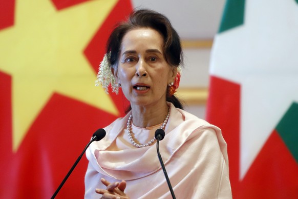 FILE - Myanmar&#039;s leader Aung San Suu Kyi speaks during a joint press conference with Vietnam&#039;s Prime Minister Nguyen Xuan Phuc after their meeting at the Presidential Palace in Naypyitaw, My ...