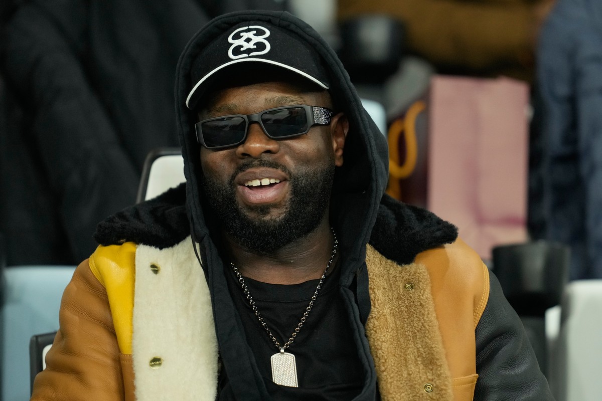 Congolese singer and rapper Gims looks out from the stands during the Africa Cup of Nations group D soccer match between Botswana and DR Congo in Rabat, Morocco, Tuesday, Dec. 30, 2025. (AP Photo/Mosa ...