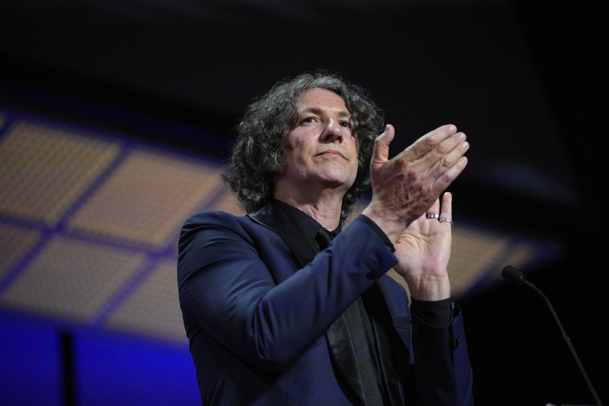 Jonathan Glazer accepts the jury prize award for the film &#039;The Zone of Interest&#039;, during the awards ceremony of the 76th international film festival, Cannes, southern France, Saturday, May 2 ...