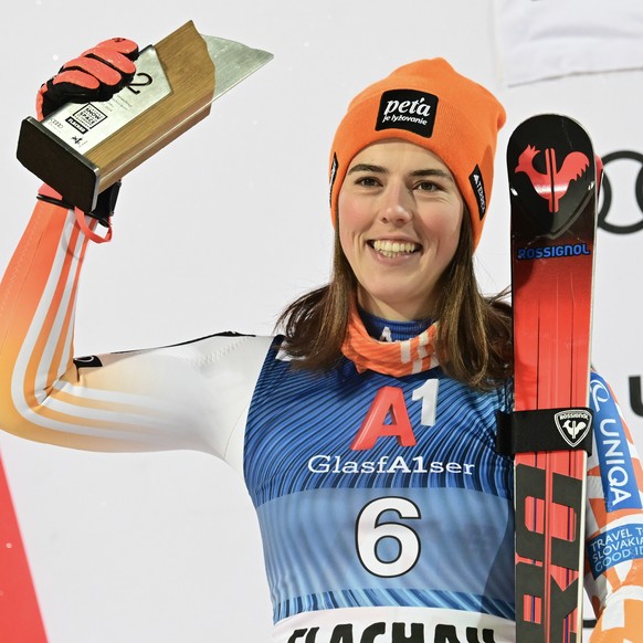 epa11083645 Second placed Petra Vlhova of Slovakia celebrates on the podium after the Women&#039;s Slalom race at the FIS Alpine Skiing World Cup in Flachau, Austria, 16 January 2024. EPA/CHRISTIAN BR ...