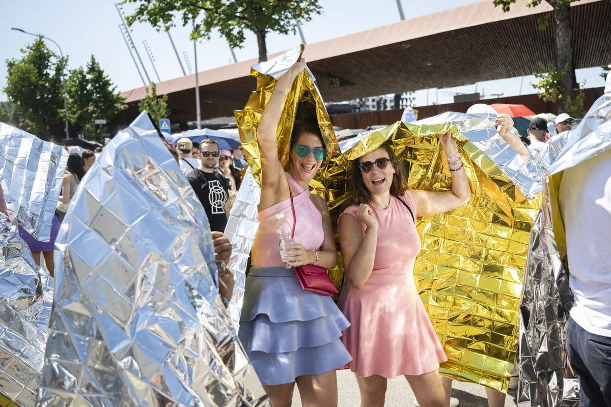 epa11468173 Fans, also known as 'Swifties', wait to attend the concert of US singer and songwriter Taylor Swift as part of her 'The Eras Tour' in front of the Letzigrund Stadium in ...