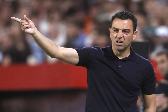 epa11372533 Barcelona&#039;s head coach Xavi Hernandez gestures during the Spanish LaLiga soccer match between Sevilla FC against FC Barcelona, in Seville, Spain, 26 May 2024. EPA/Jose Manuel Vidal