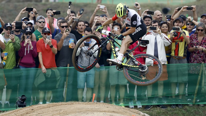 Victor Koretzky of France compete in the men&#039;s cross-country cycling mountain bike race at the 2016 Summer Olympics in Rio de Janeiro, Brazil, Saturday, Aug. 20, 2016. (AP Photo/Patrick Semansky)