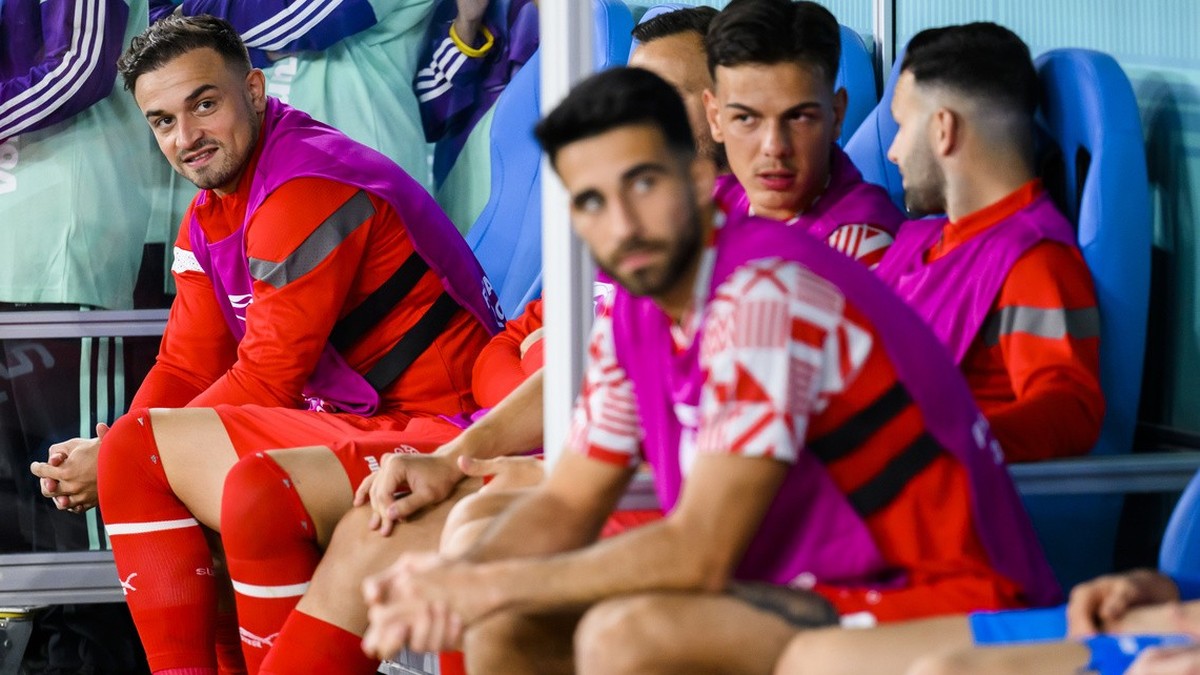Switzerland's midfielder Xherdan Shaqiri, left, reacts on the bench during the FIFA World Cup Qatar 2022 group G soccer match between Brazil and Switzerland at the Stadium 974, in Doha, Qatar, Mo ...