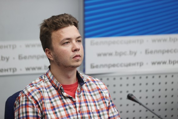 epa09270675 A handout photo made available by Belta shows Belarusian opposition activist Roman Protasevich attends a press conference by Belarusian Foreign Ministry on Ryanair Athens-Vilnius flight on ...