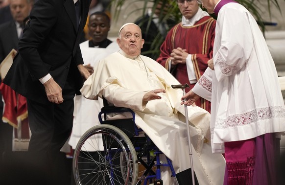 FILE- Pope Francis leaves after a Pentecostal mass in St. Peter&#039;s Basilica at the Vatican, Sunday, May 28, 2023. Pope Francis has made a quick trip to the hospital for tests, it was announced Tue ...