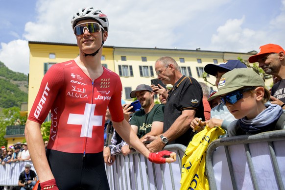 Mauro Schmid from Switzerland of team Team Jayco AlUla arrives for the start ahead the first stage, a 170,6 km race around Martigny at the 79th Tour de Romandie UCI World Tour Cycling race, in Martign ...