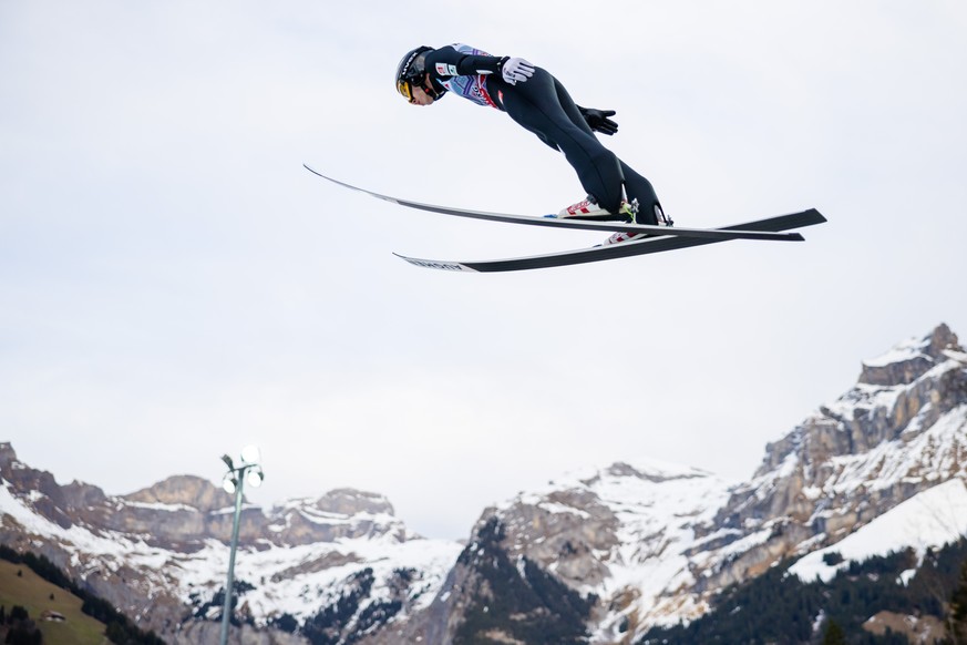 Valentin Foubert of France soars through the air during the men's FIS Ski Jumping World Cup competition in Engelberg, Switzerland, Sunday, Dec. 21, 2025. (Philipp Schmidli/Keystone via AP)
Switze ...