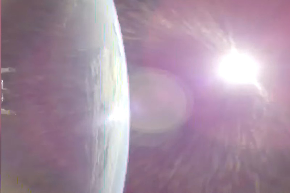 This image taken from video provided by NASA shows the Earth, left, from NASA's Orion spacecraft as it fired its engines heading toward the moon Thursday, April 2, 2026. (NASA via AP)
NASA Artemi ...
