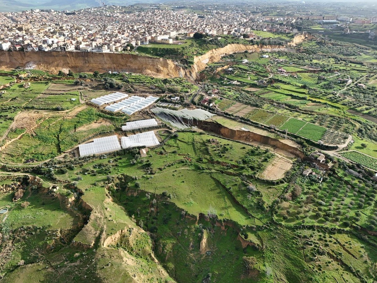 epa12682663 An aerial view taken with a drone shows the site of a landslide at Niscemi, Caltanissetta province, Sicily Island, southern Italy, 26 January 2026. Following days of heavy rainfall brought ...