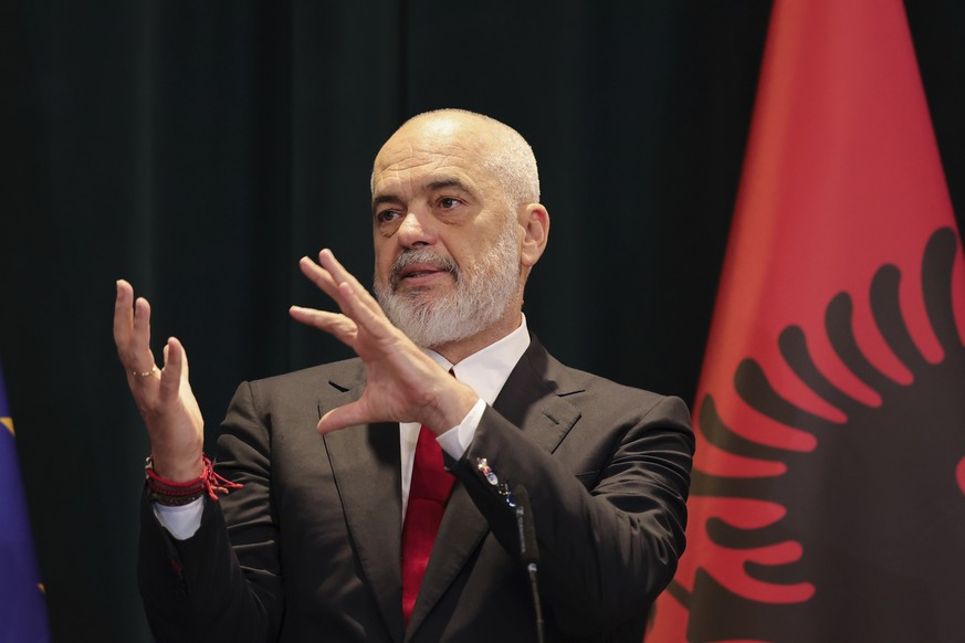 Albania&#039;s Prime Minister Edi Rama addresses journalists during a joint news conference with President of France Emmanuel Macron following a bilateral meeting in Tirana, Saturday, May 17, 2025. (A ...