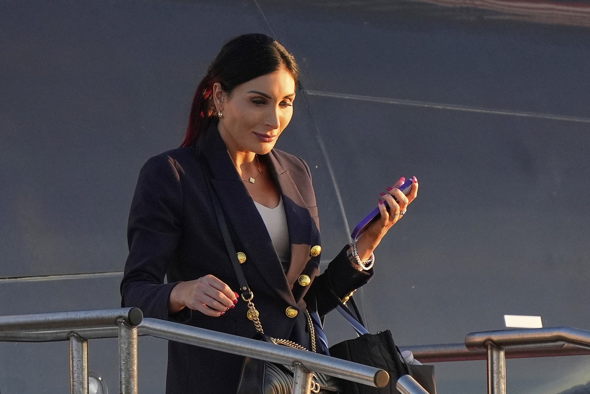 FILE - Laura Loomer arrives at Philadelphia International Airport, Sept. 10, 2024, in Philadelphia. (AP Photo/Chris Szagola, File)
Trump Conspiracy Theories
