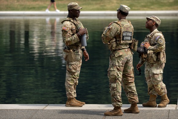 National Guard members stand near the Lincoln Memorial Reflecting Pool, Monday, June 22, 2026, in Washington. (AP Photo/Mark Schiefelbein)
Lincoln Memorial Reflecting Pool