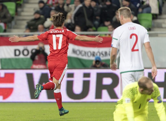 epa05575488 Switzerland&#039;s Valentin Stocker (L) cheers after scoring the winning goal during the FIFA World Cup 2018 group B qualification soccer match between Hungary and Switzerland at the Group ...