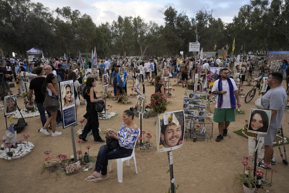 People visit the site of the Nova music festival, where hundreds of revelers were killed and abducted by Hamas and taken into Gaza, on the one-year anniversary of the attack, near Kibbutz Reim, southe ...