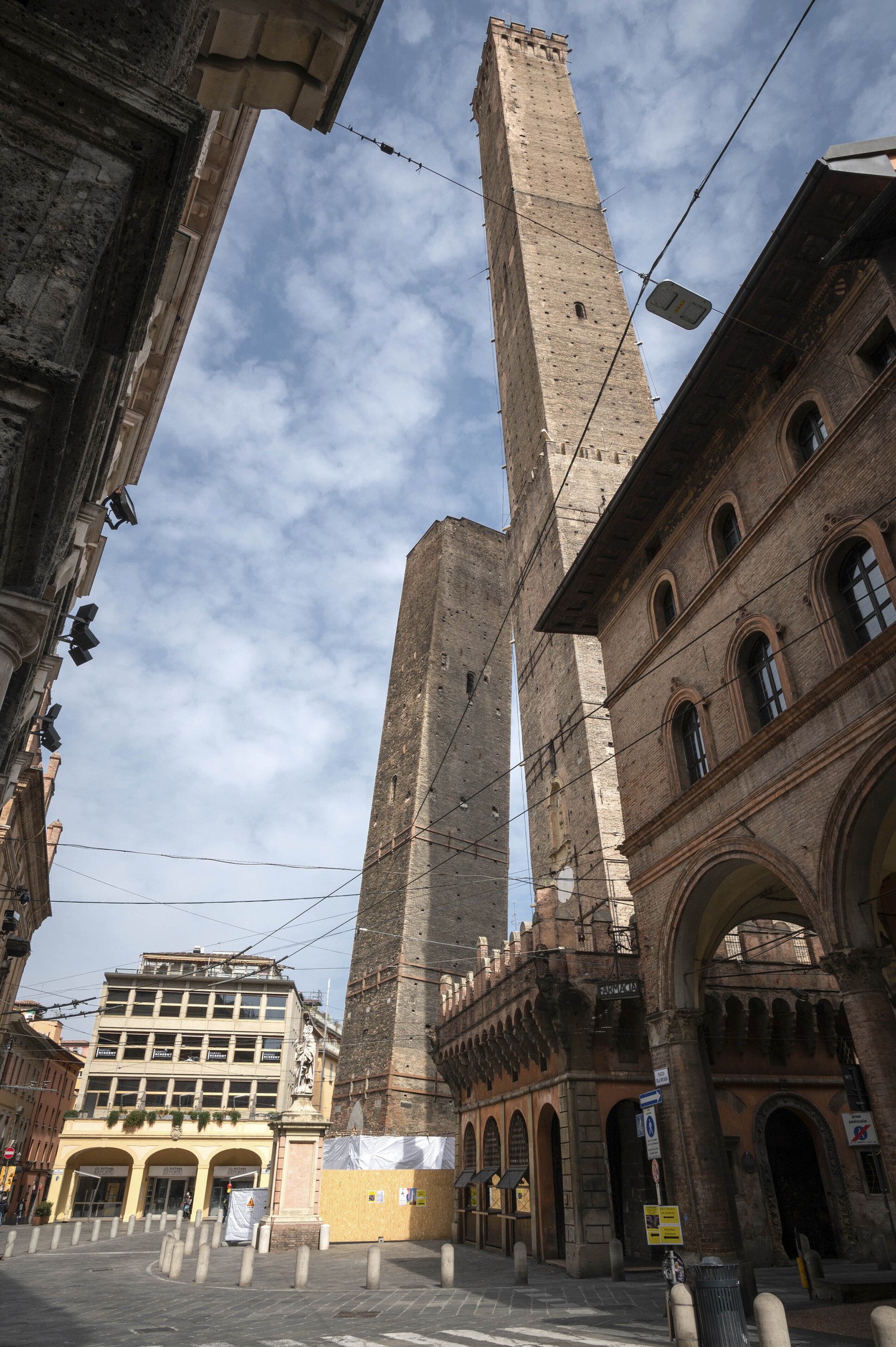 The Garisenda, left, and Asinelli towers are pictured in Bologna, Italy, March 20, 2020. Bologna&#039;s Garisenda tower has been locked down for fear it could collapse. Authorities have provided a sec ...