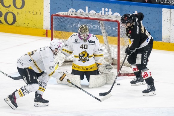 From left, le gardien Damiano Ciaccio (HCA) and Calvin Thuerkauf (HCL), celebrate 2-0 goal, during the play-out of National League A (NLA) Swiss Championship 2024/25 between HC Lugano and HC Ajoie at  ...