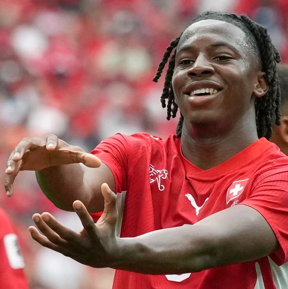 Switzerland's Johan Manzambi (9) celebrates after scoring during the World Cup Group B soccer match between Switzerland and Canada in Vancouver, British Columbia, Wednesday, June 24, 2026. (AP Ph ...