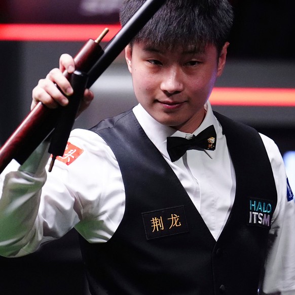 China&#039;s Zhao Xintong during his match with England&#039;s Ronnie O&#039;Sullivan on day fourteen of the World Snooker Championship at the Crucible Theatre, Sheffield, England, Friday May 2, 2025. ...