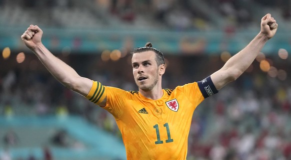 epa09277672 Gareth Bale of Wales celebrates his team&#039;s 2-0 lead during the UEFA EURO 2020 group A preliminary round soccer match between Turkey and Wales in Baku, Azerbaijan, 16 June 2021. EPA/Da ...