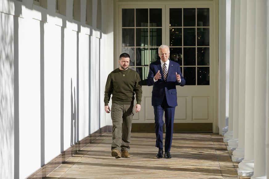 President Joe Biden and Ukrainian President Volodymyr Zelenskyy walk past the White House Colonnade, Wednesday, December 12.  December 21, 2022, in Washington.  (AP Photo/Patrick Semansky) Joe Biden, Volodymyr Ze...