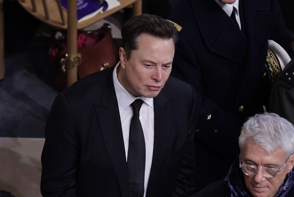 epa11763165 Businessman Elon Musk (C) attends the reopening ceremony of the Notre Dame de Paris Cathedral in Paris, France 07 December 2024. Paris? Cathedral took almost 6 years to rebuild after been  ...