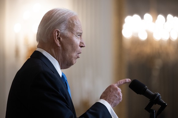epa11150724 US President Joe Biden delivers remarks in the State Dining Room of the White House in Washington, DC, USA, 13 February 2024. President Biden urged the US House of Representatives to pass  ...