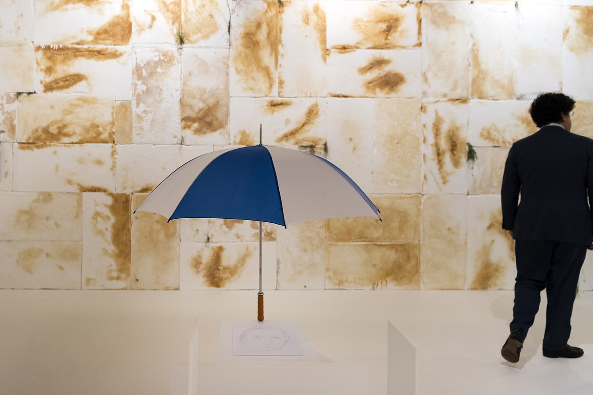 The artwork "Umbrella White Element" (2016) by Belgian artists Jos de Gruyter and Harald Thys is on display at the international art show Art Basel, in Basel, Switzerland, on Wednesday, June ...