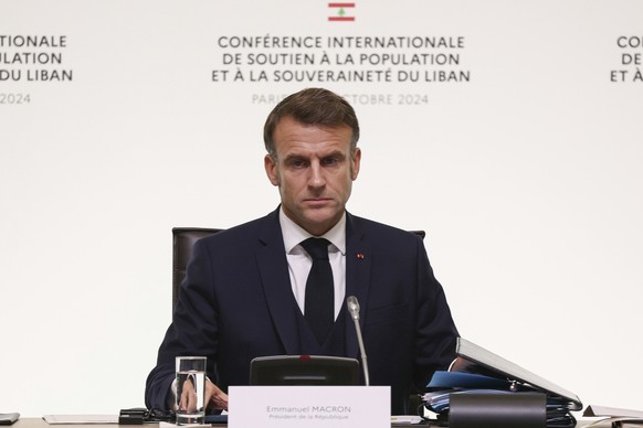 France&#039;s President Emmanuel Macron attends an international conference for Lebanon in Paris, Thursday, Oct.24, 2024. (Alain Jocard, Pool via AP)
