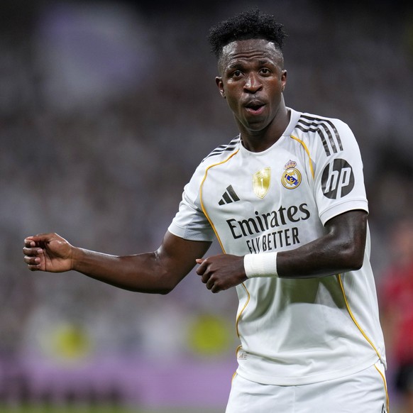 FILE - Real Madrid&#039;s Vinicius Junior celebrates scoring his side&#039;s second goal during the Spanish La Liga soccer match between Real Madrid and Mallorca in Madrid, Saturday, Aug. 30, 2025. (A ...