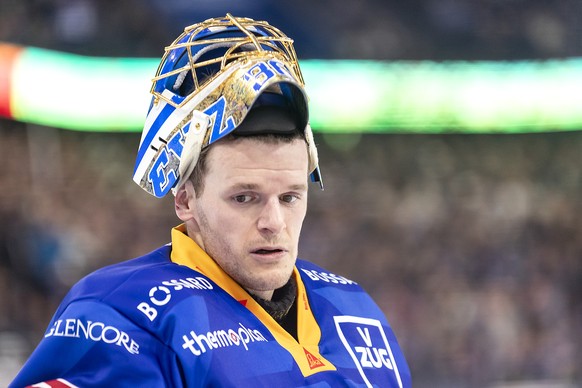 Torhueter Leonardo Genoni (EVZ) im Spiel der Eishockey National League zwischen dem EV Zug, EVZ, und Fribourg-Gotteron am Montag, 23. Dezember 2024 in der Bossard Arena in Zug. (KEYSTONE/Alexandra Wey ...