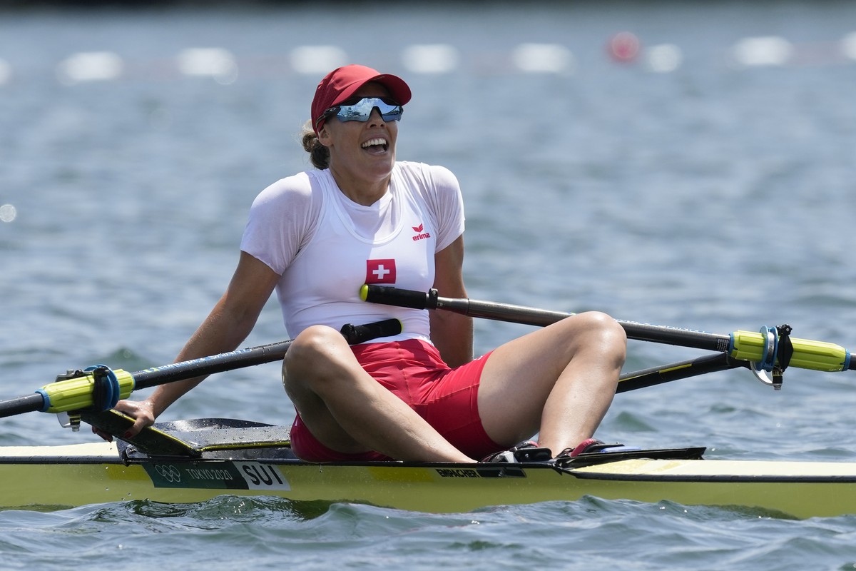 Jeannine Gmelin of Switzerland reacts after competing in the women's rowing single sculls semifinal at the 2020 Summer Olympics, Thursday, July 29, 2021, in Tokyo, Japan. (AP Photo/Darron Cumming ...