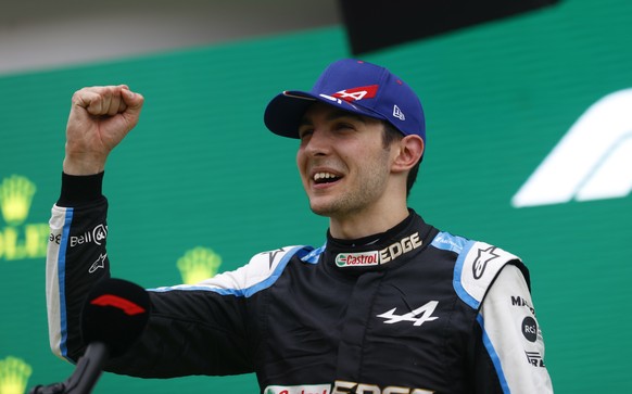 epa09386074 French Formula One driver Esteban Ocon of the Alpine F1 Team celebrates after winning the Formula One Grand Prix of Hungary at the Hungaroring circuit in Mogyorod, near Budapest, Hungary,  ...