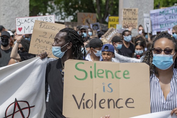 People demonstrate against racism after the worldwide movement of the Black Lives Matter (BLM) protest against the recent death of George Floyd in Luzern, Switzerland, Saturday, 13 June 2020. Floyd, a 46-year-old African-American man, died on 25 May after being detained by police officers in Minneapolis (Minnesota), USA. (KEYSTONE/Urs Flueeler)