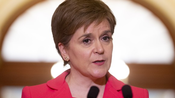 epa09951668 First Minister of Scotland Nicola Sturgeon delivers brief remarks to members of the news media beside US Speaker of the House Nancy Pelosi (not pictured) before their meeting on Capitol Hi ...