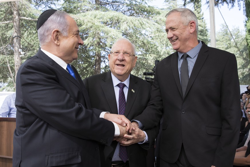 epa08329017 (FILE) - Israeli Prime Minister Benjamin Netanyahu (L), Israeli President Reuven Rivlin (C) and Benny Gantz, former Israeli Army Chief of Staff and chairman of the Blue and White Israeli c ...